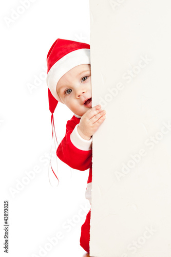 small Santa claus child loo...