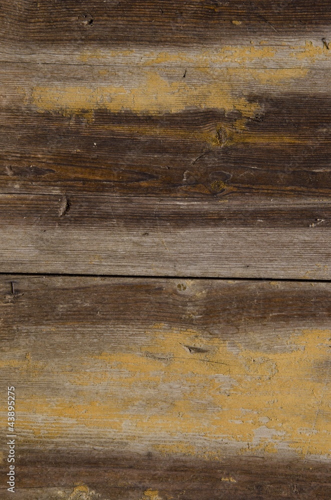Naklejka premium Old wooden wall fragment texture background.