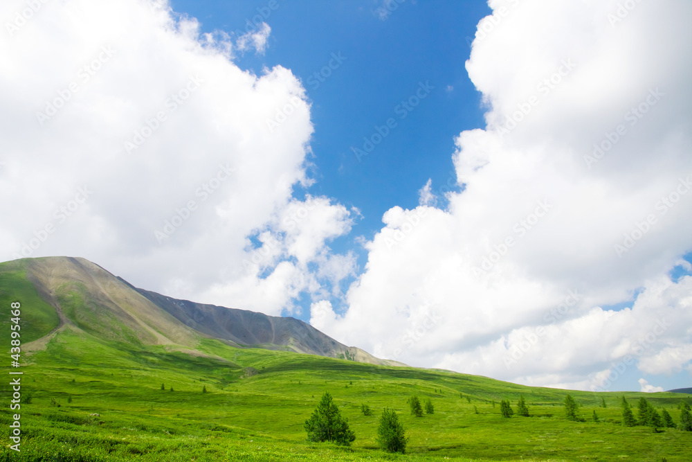 Mountain landscape with the sky and clouds