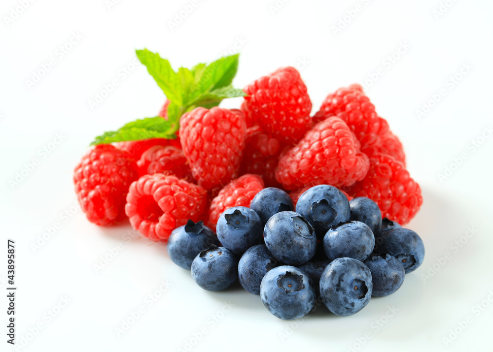 Fresh raspberries and blueberries Fresh raspberries and blueberries