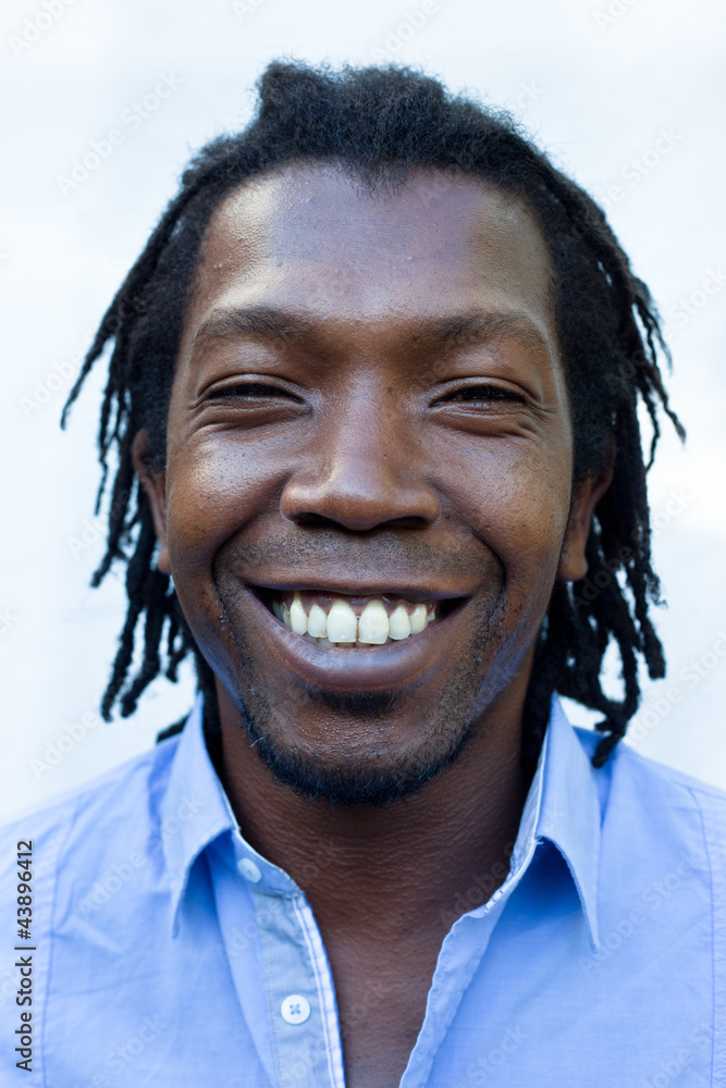 Close up portrait of a black Jamaican man with dreadlocks. Stock Photo