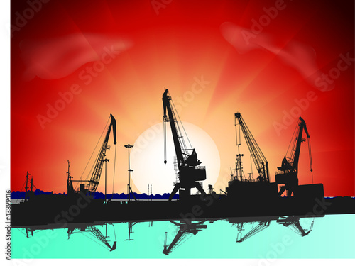 Silhouettes of port constructions on sunset