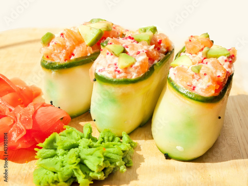 Fresh cucumber sushi with  salmon and avakado