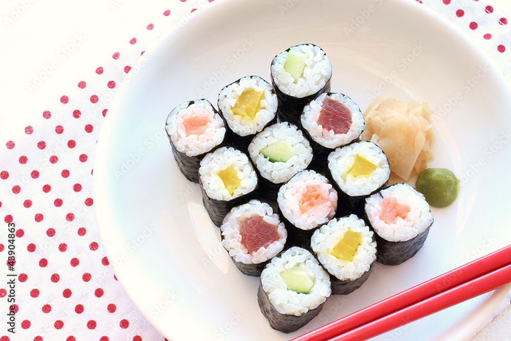 Hosomaki sushi tuna, somked salmon and vegetables inside Hosomaki sushi tuna, somked salmon and vegetables inside