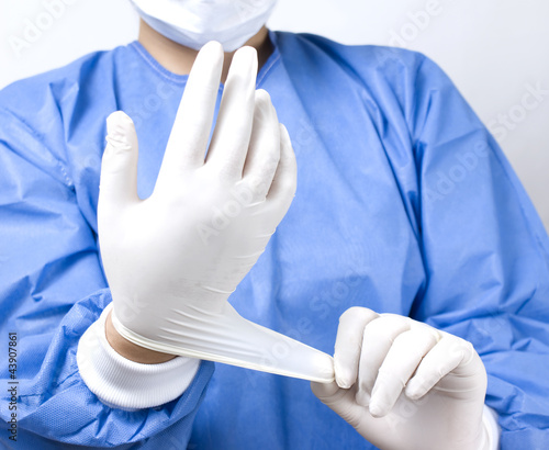 doctor putting gloves