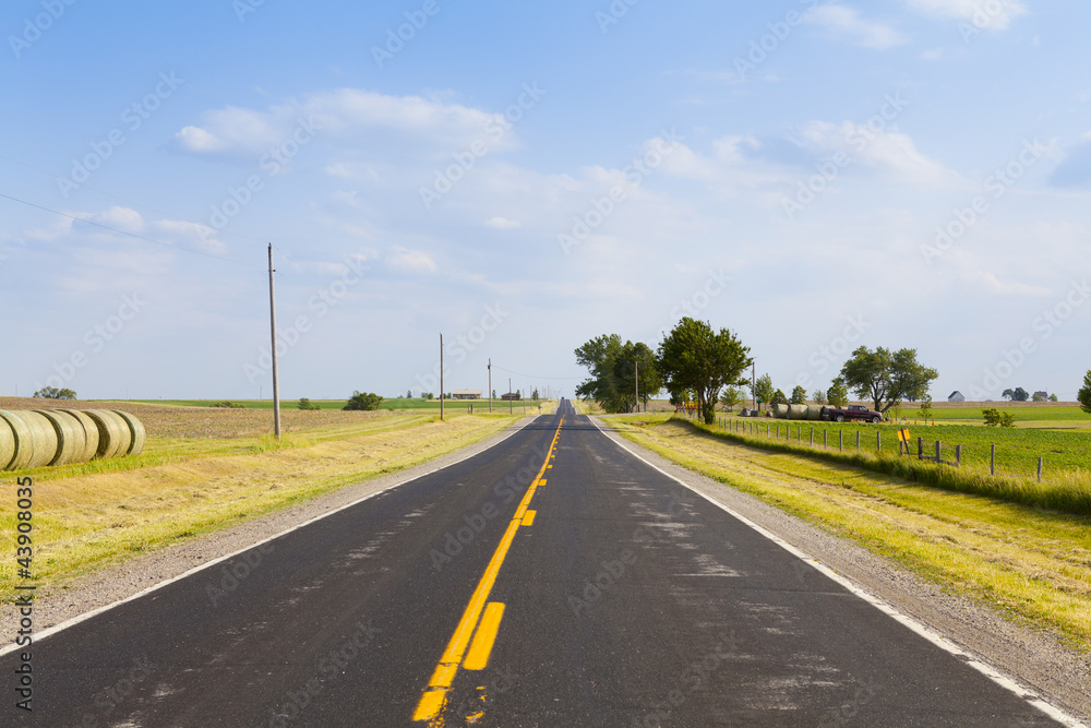 American Country Road With Cloudy Blue Sky