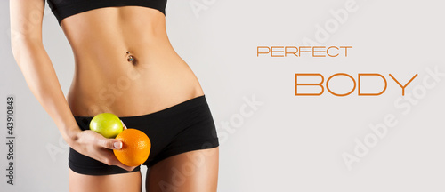 Concept of a healthy body. healthy lifestyle. Woman holding frui