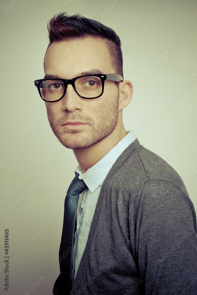 closeup portrait of handsome young adult man wearing glasses closeup portrait of handsome young adult man wearing glasses