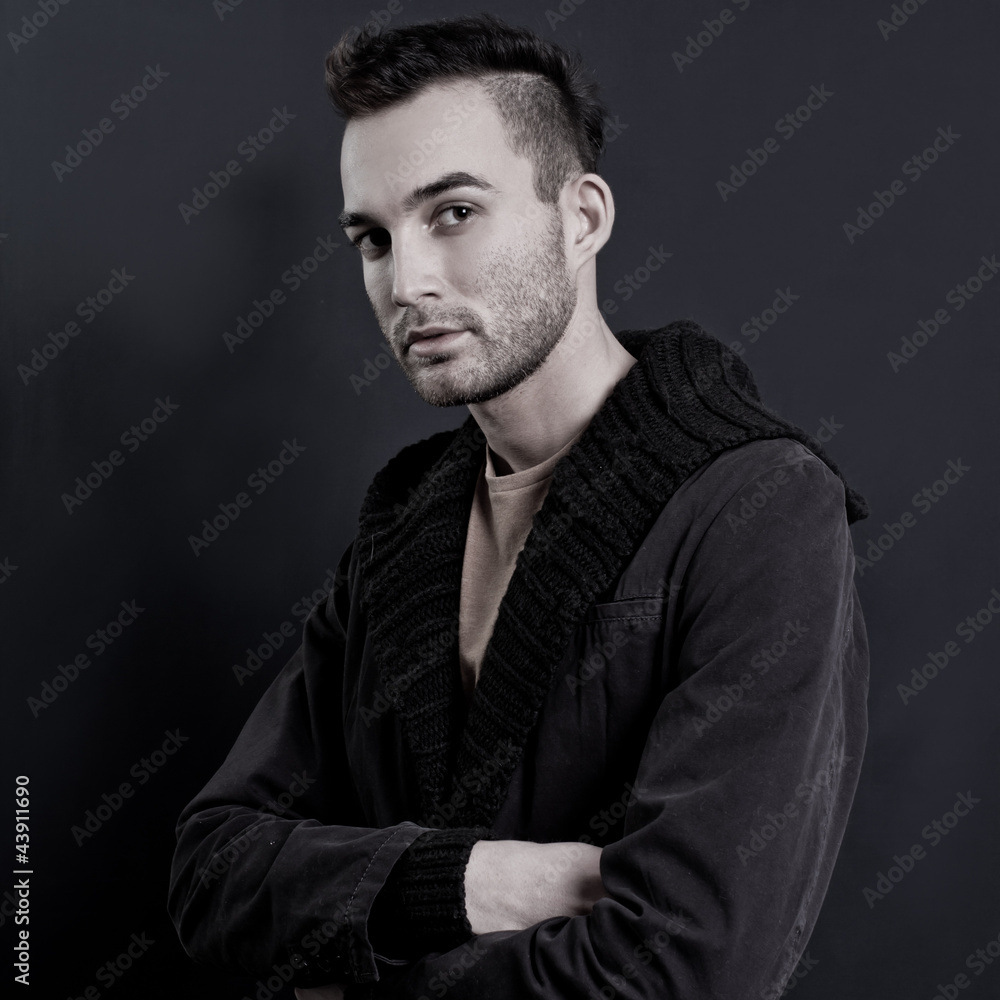 fashion portrait of the young beautiful man