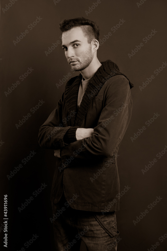 fashion portrait of the young beautiful man - sepia fashion portrait of the young beautiful man - sepia
