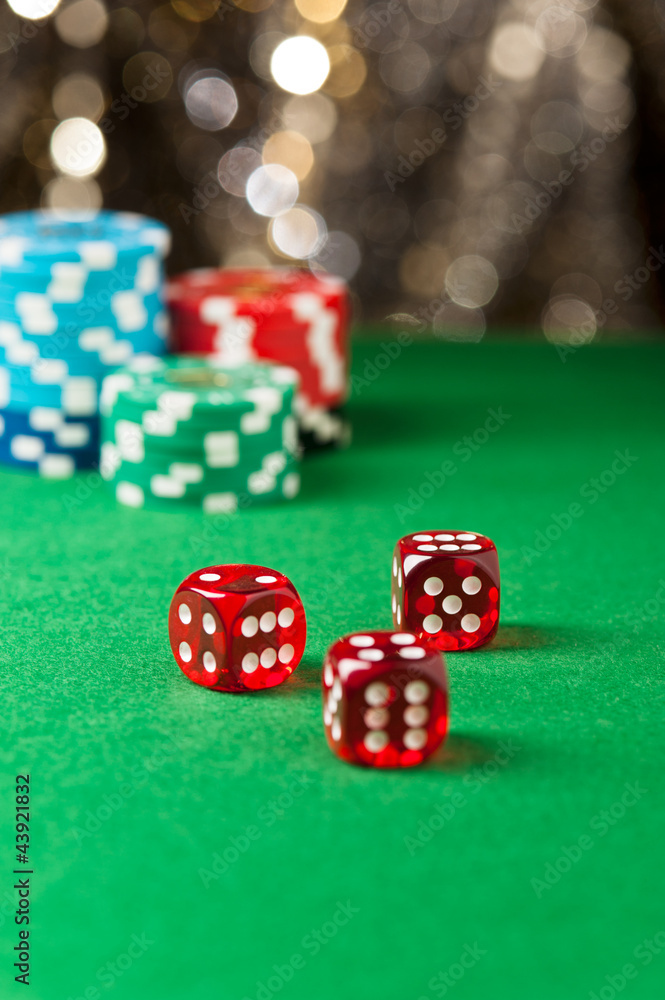 Red dice on a casino table Red dice on a casino table