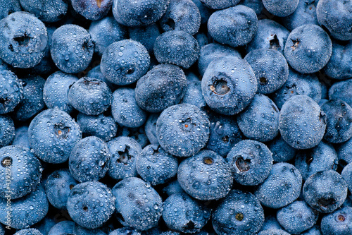 Wet blueberries background