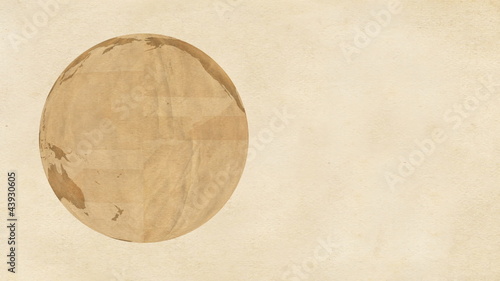Animation of a brown paper Earth, rotating on paper background.