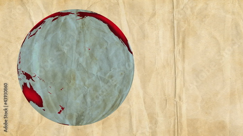 Animation of a paper Earth, rotating on a crumpled background.
