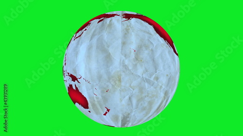 Animation of Earth made of paper, rotating on green screen.