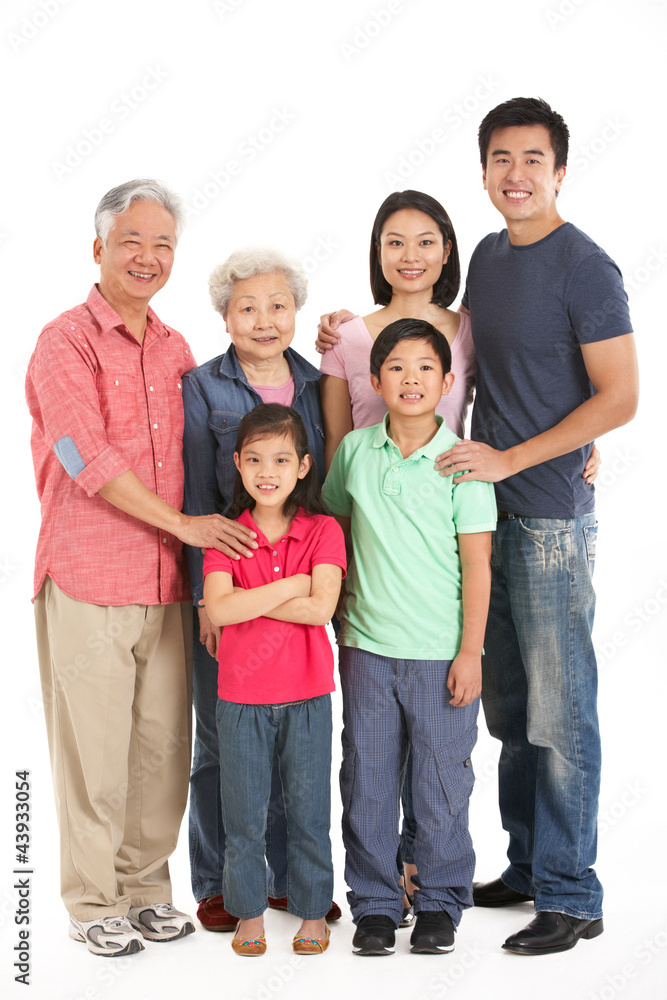 Full Length Studio Shot Of Multi-Generation Chinese Family Full Length Studio Shot Of Multi-Generation Chinese Family