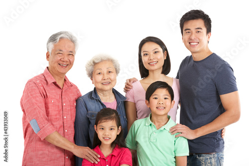 Studio Shot Of Multi-Generation Chinese Family © Monkey Business