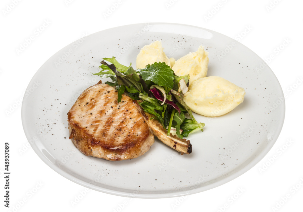 Grilled pork with salad and potato Grilled pork with salad and potato