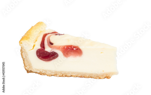 Closeup of a slice of cherry cheesecake on a white background