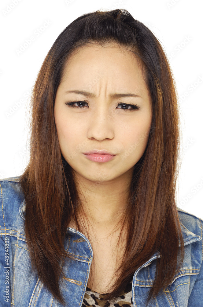 girl with angry or upset expression on face girl with angry or upset expression on face