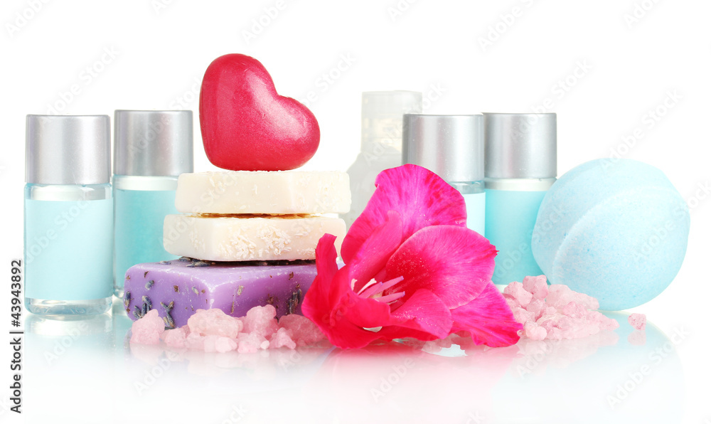 cosmetic bottles, soap and flower, isolated on white. cosmetic bottles, soap and flower, isolated on white.