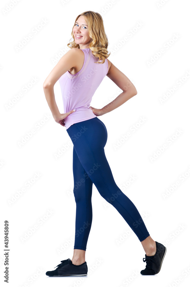 Female sportsman doing exercises on white Female sportsman doing exercises on white