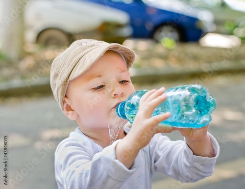Child drinking from bottle
