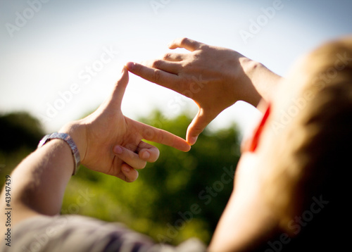 Frame made of hands