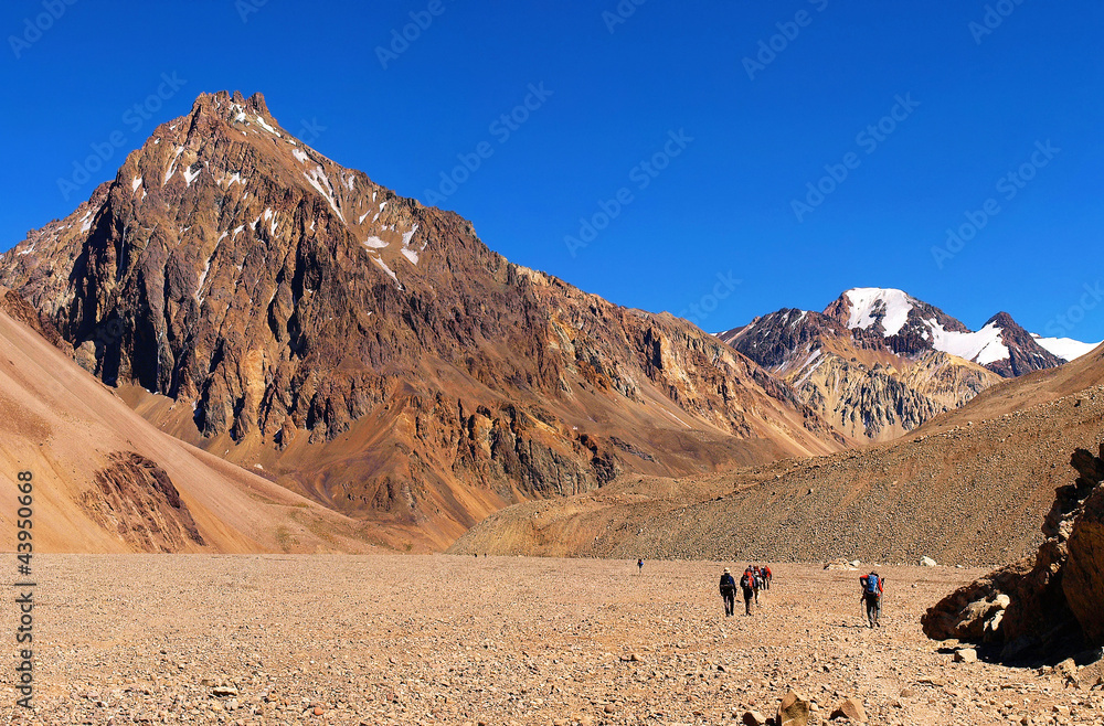 Hikers trekking in Andes, Argentina, South America