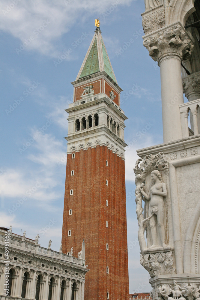 Bell Tower of St Mark and a statue of the palazzo ducale