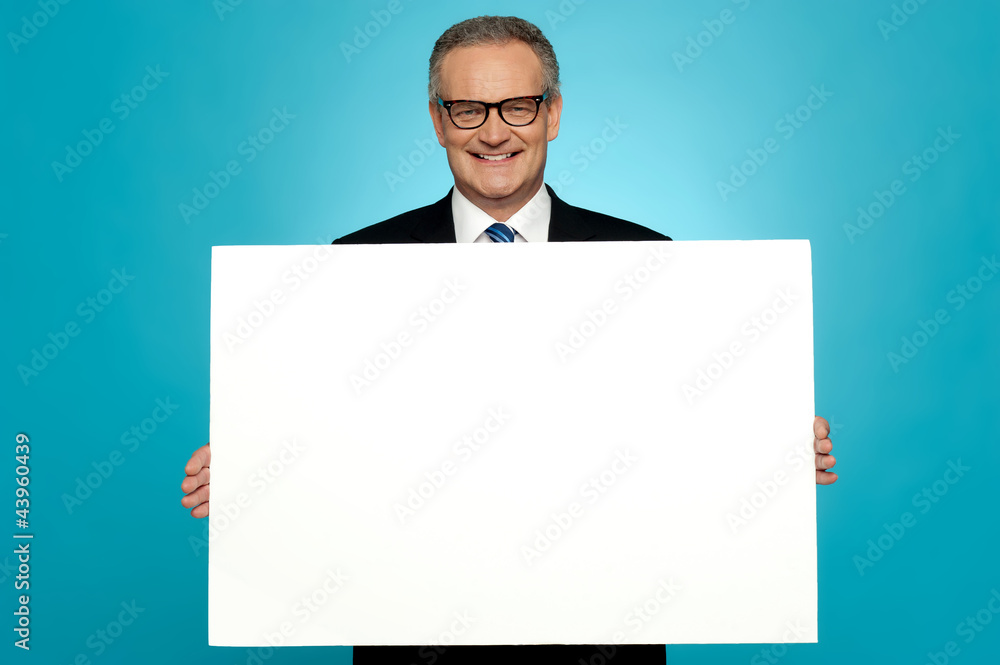 Business representative holding blank ad board Business representative holding blank ad board