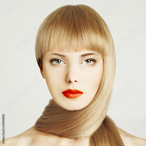 Blond hair. Beautiful woman face with make-up #43964865