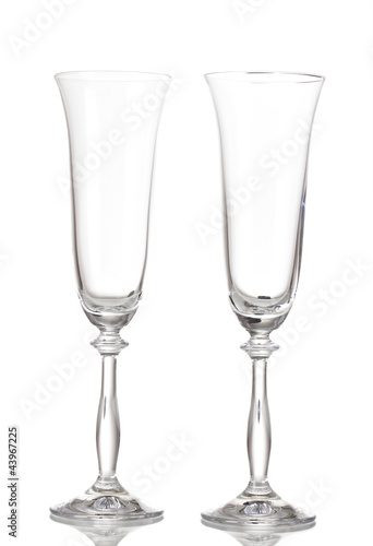 empty glasses for champagne isolated on white.