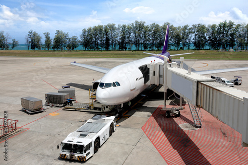 Parked aircraft parked in the airport photo