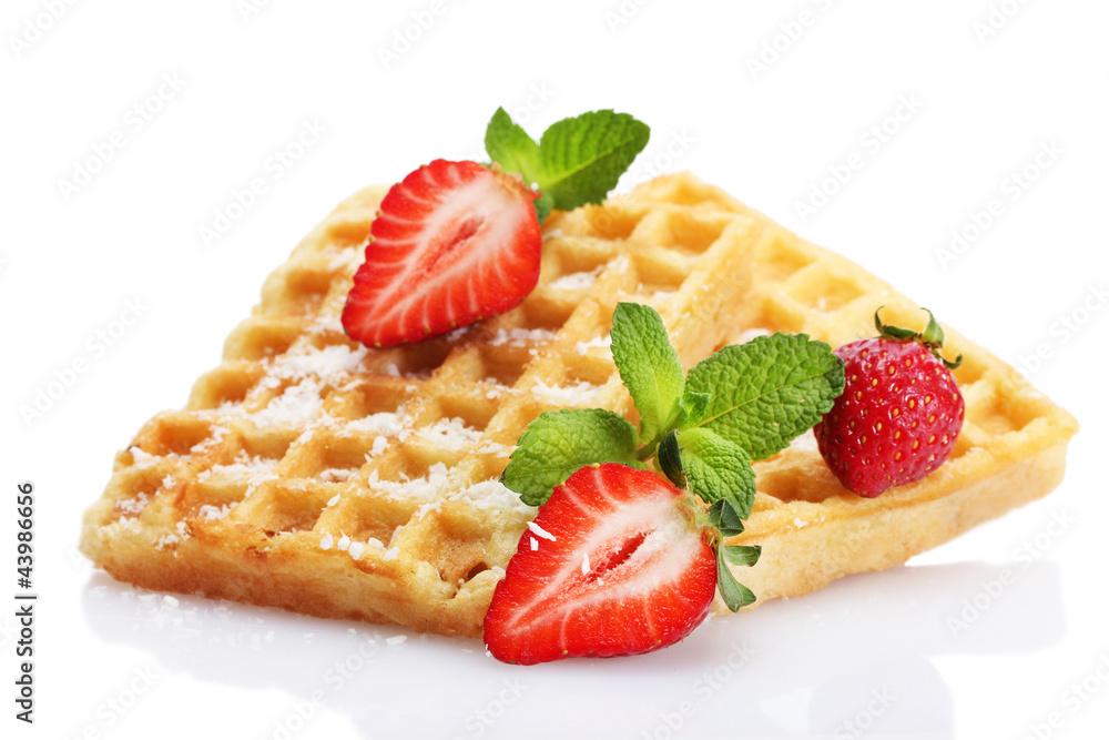 belgium waffles with strawberries and mint  isolated on white