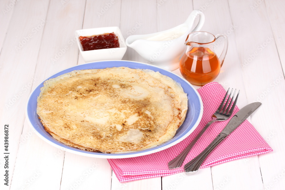 Stack of tasty pancakes on wooden background Stack of tasty pancakes on wooden background