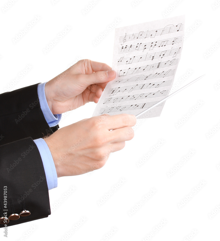 Fototapeta premium Music conductor hands with baton and notes isolated on white