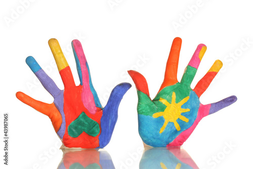 Brightly colored hands on white background close-up