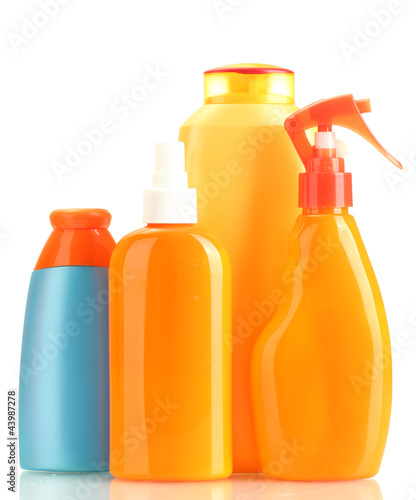 Bottles with suntan cream isolated on white