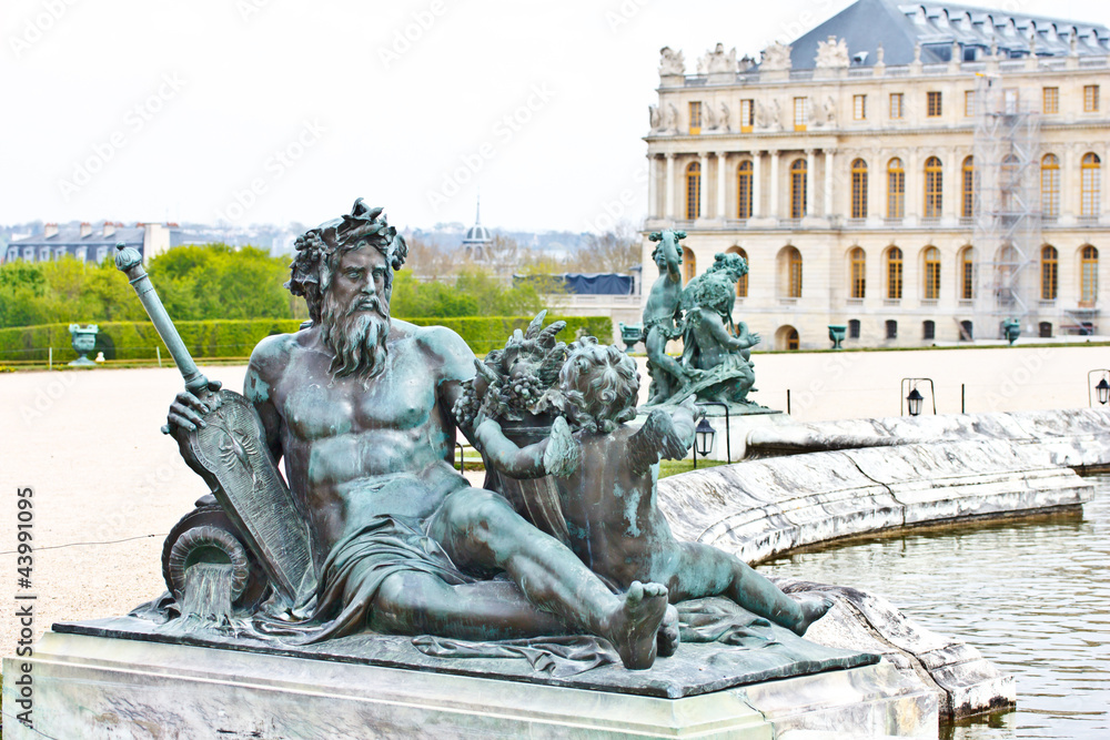 sculpture in the garden of Versailles palace, Paris, France sculpture in the garden of Versailles palace, Paris, France