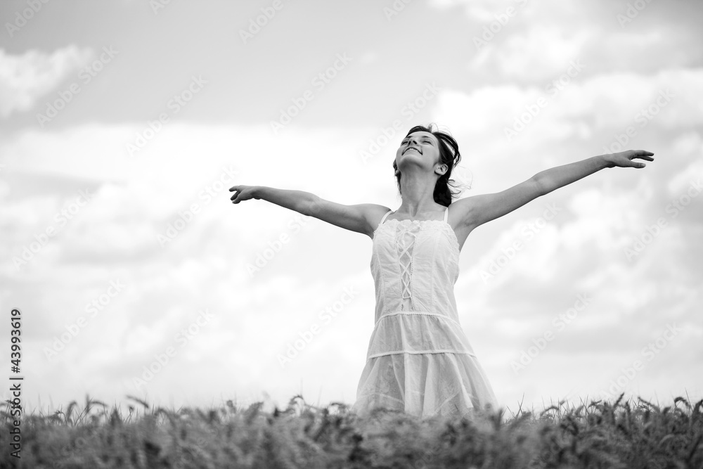 Woman in wheat field, black and white Woman in wheat field, black and white