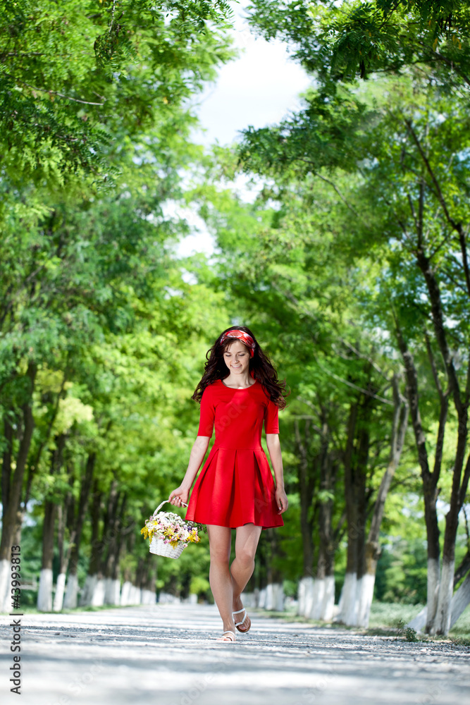 .Beautiful girl enjoying in the spring time walking and holding .Beautiful girl enjoying in the spring time walking and holding