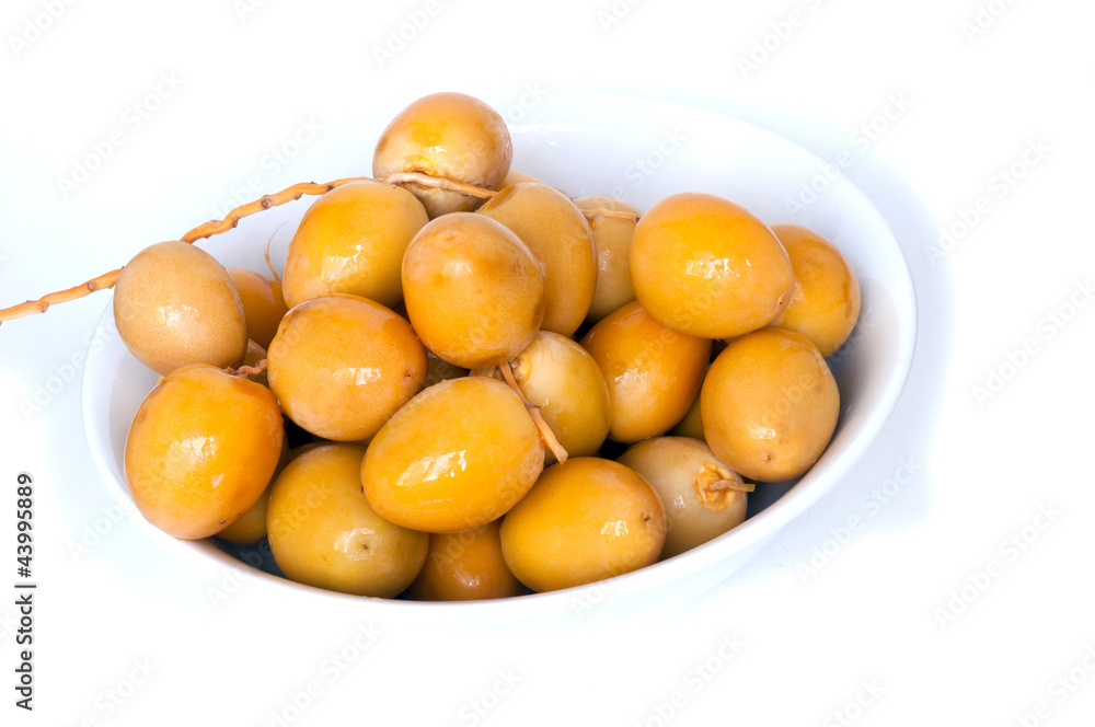 Fresh date in  a white bowl