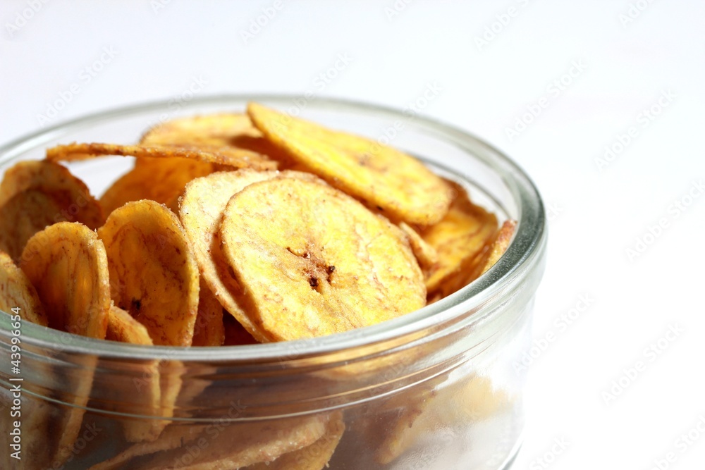a bowl of banana chips a bowl of banana chips