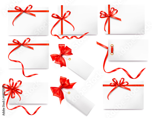 Set of card notes with red gift bows with ribbons