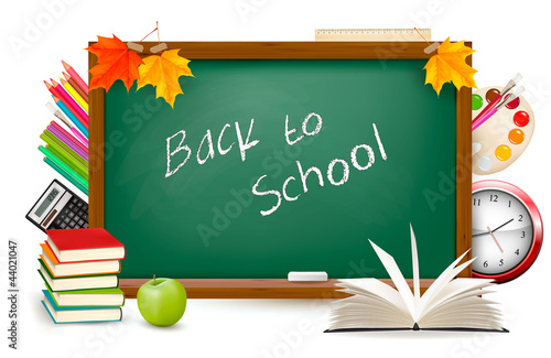Back to school  Green desk with school supplies