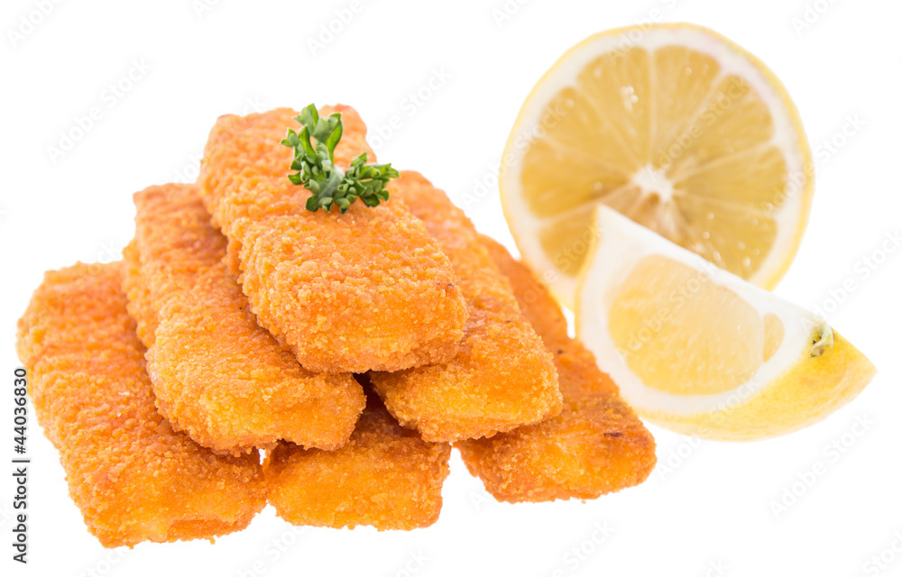 Fish Fingers with lemon pieces on white Fish Fingers with lemon pieces on white