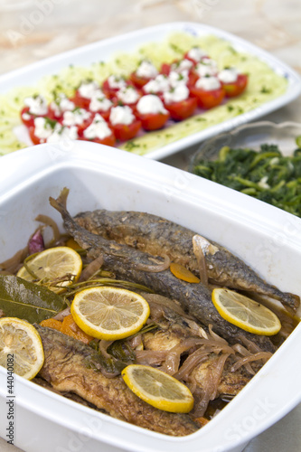Grilled young mackerel in marinade with vegetables