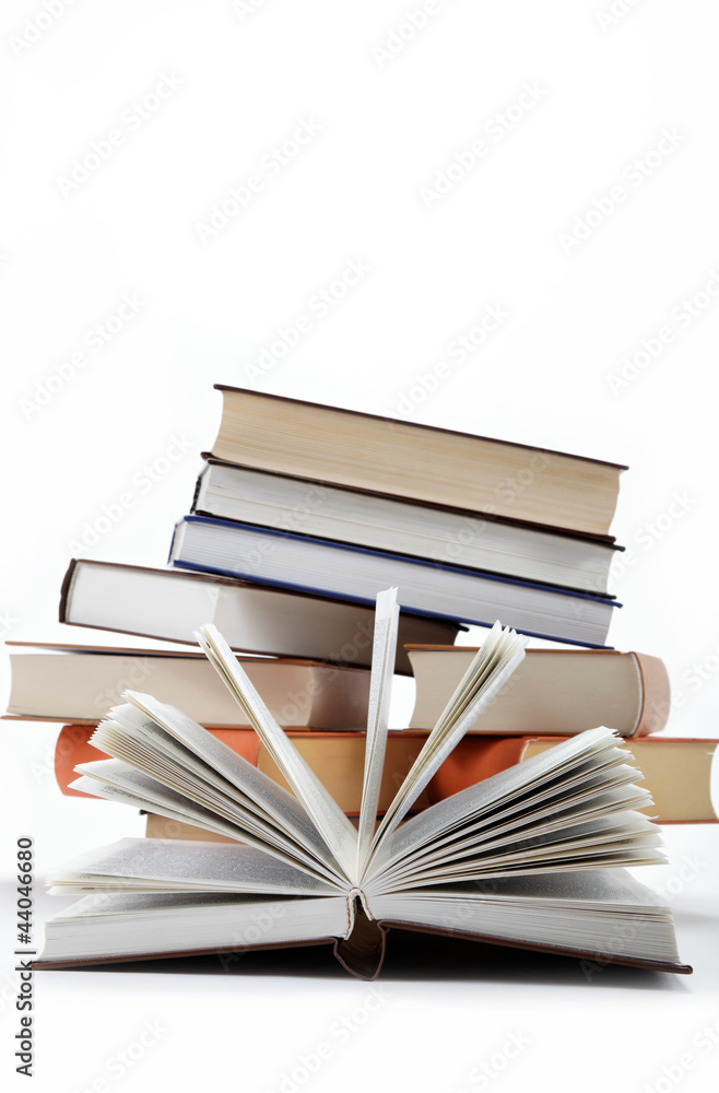 Fototapeta premium A stack of books on a white background.