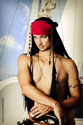 Male pirate on a sail boat